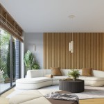 Lampa wisząca Karbon 3P w kolorze beżowym z trzema źródłami światła GU10. Zawieszona na cienkich linkach, znajduje się nad okrągłym stolikiem w nowoczesnym wnętrzu z drewnianą ścianą i roślinami w tle.