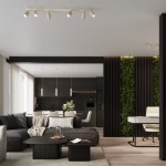 Beżowa lampa sufitowa (spot) Karbon z sześcioma oprawami GU10, zamontowana na suficie, z widocznymi regulowanymi reflektorami. Lampa znajduje się w nowoczesnym wnętrzu z ciemnymi meblami i roślinnością na ścianie.