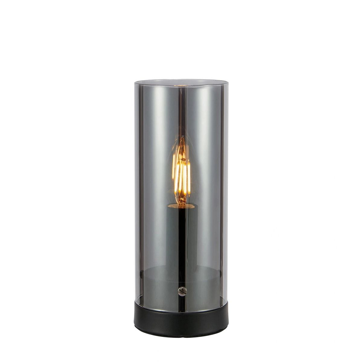 Lampa stołowa z jednym gniazdem E14, o cylindrycznym kształcie. Wykonana z dymnego szkła i czarnego metalu, z widoczną żarówką wewnątrz. Ujęcie frontalne, lampa stoi na płaskiej powierzchni.