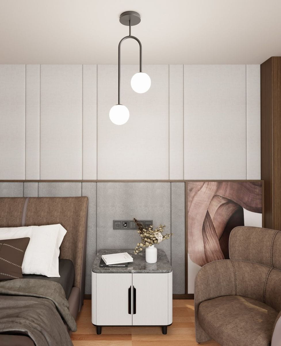 Lampa sufitowa Atria 2xE14 w kolorze czarnym z opalowymi kloszami, zawieszona na podwójnym ramieniu. Stylowy design, idealna do nowoczesnych wnętrz, umieszczona w pokoju z jasnymi ścianami i eleganckim meblem obok.