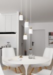 Lampa wisząca Target 4xE27 w kolorze białym z złotymi detalami, zawieszona na długich sznurach. Cztery cylindryczne klosze o matowej powierzchni, umieszczone w równych odstępach, w nowoczesnej kuchni z jasnym tłem i okrągłym stołem.