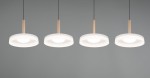 Lampa wisząca Celeste z czterema źródłami LED, o mocy 30W. Posiada białe klosze z matowego szkła i miedziane, metalowe zawieszenia. Ułożona w linii, zawieszona na czarnych linkach, na szarym tle. Idealna do nowoczesnych wnętrz.