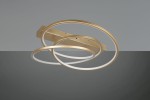 Lampa sufitowa Darvin w kolorze złotym z jednym źródłem LED o mocy 34W. Posiada trzy okręgi w różnych rozmiarach, z białym podświetleniem. Ujęcie z boku, montowana do sufitu. Tło w odcieniu szarym, prostym i jednolitym.
