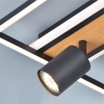 Korda lampa sufitowa z jedną oprawą GU10 i jedną diodą LED 16W, w kolorze czarnym z drewnianym akcentem. Ujęcie z boku, pokazujące metalowy klosz i elementy konstrukcyjne na tle jasnego sufitu.