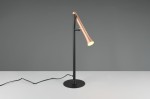Lampa stołowa Fiato o konstrukcji czarnej z metalowym, złotym kloszem. Ujęcie frontalne, lampa stoi na okrągłej podstawie. Widoczny kabel zasilający. Styl minimalistyczny, nowoczesny design.