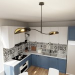 Czarna lampa sufitowa 2-punktowa Lotus z metalowymi kloszami w złotym kolorze, zawieszona na cienkim stelażu. Ujęcie z góry w nowoczesnej kuchni z niebieskimi szafkami i dekoracyjną płytką. Produkt w pozycji wiszącej, oświetlający przestrzeń roboczą.
