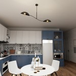 Czarna lampa sufitowa 2-punktowa Lotus z złotymi detalami, zawieszona w kuchni, z lekko zakrzywionym ramieniem. Oświetlenie skierowane w dół, w nowoczesnym wnętrzu z niebieskimi i białymi meblami oraz dekoracyjną ścianą.