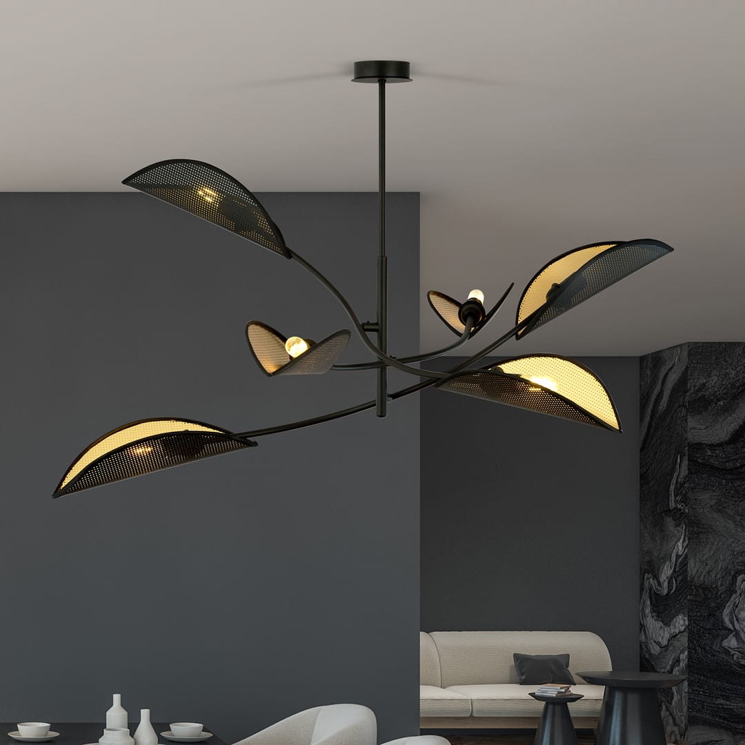 Czarna lampa sufitowa Lotus 6-punktowa z elementami złotymi, o kształcie liści, zawieszona na cienkim stelażu. Posiada sześć kloszy w formie liści, które emitują światło, umieszczona w nowoczesnym wnętrzu.