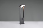 Lampa ogrodowa Malawi H61 w kolorze antracytowym, z czujnikiem ruchu, z pojedynczym źródłem światła LED 5W. Stoi na prostokątnej podstawie, z prostokątnym kloszem u góry oraz widocznym czujnikiem na froncie. Ochrona IP65.