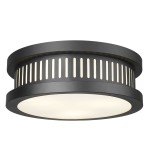 Czarna lampa sufitowa zewnętrzna Funchal z jedną oprawą E14, o okrągłym kształcie. Wykonana z metalu, z dekoracyjnymi otworami wzdłuż obrzeża i mlecznym kloszem. Zamontowana na suficie, prezentuje nowoczesny design.