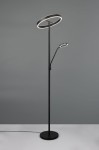 Lampa podłogowa Willis w kolorze czarnym, z dwiema okrągłymi głowicami LED, umieszczona na smukłym stelażu. Główne źródło światła znajduje się na górze, a mniejsza lampa boczna jest regulowana. Stabilna podstawa okrągła. Tło szare.