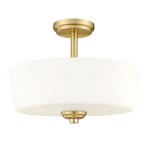 Lampa sufitowa Aspen z mosiądzu i białego szkła, z okrągłym kloszem na 3 żarówki E27. Ujęcie frontalne, montowana na suficie, z eleganckim, minimalistycznym designem. Wymiary klosza i detale montażowe nieczytelne.