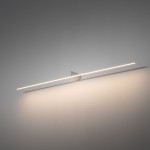 Biały kinkiet Spin 120 z jedną diodą LED o mocy 16W i temperaturze barwowej 3000K. Zamontowany na ścianie, ma minimalistyczny, prosty design z cienką linią światła oraz zaokrąglonym uchwytem. Tło w jasnym kolorze.