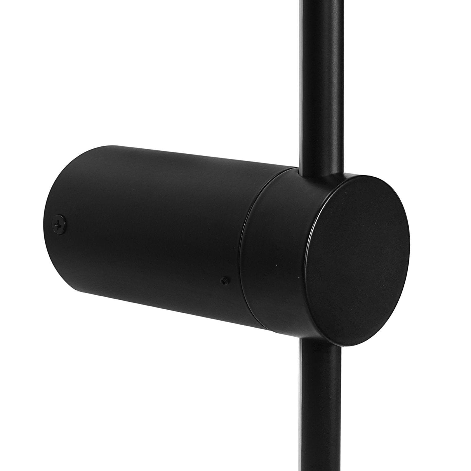 Kinkiet Uno 90 w kolorze czarnym, z okrągłą oprawą i prostą, minimalistyczną konstrukcją. Widoczny element montażowy, materiał metalowy. Kinkiet przeznaczony do jednego źródła światła LED o mocy 13W i temperaturze barwowej 4000K.