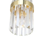 Lampa wisząca Vetro z jedną oprawą E14, złota, z przezroczystymi, szklanymi elementami w kształcie ostrych piramid, umieszczona na metalowej podstawie. Ujęcie z góry, podkreślające detale wykończenia i efekt świetlny.