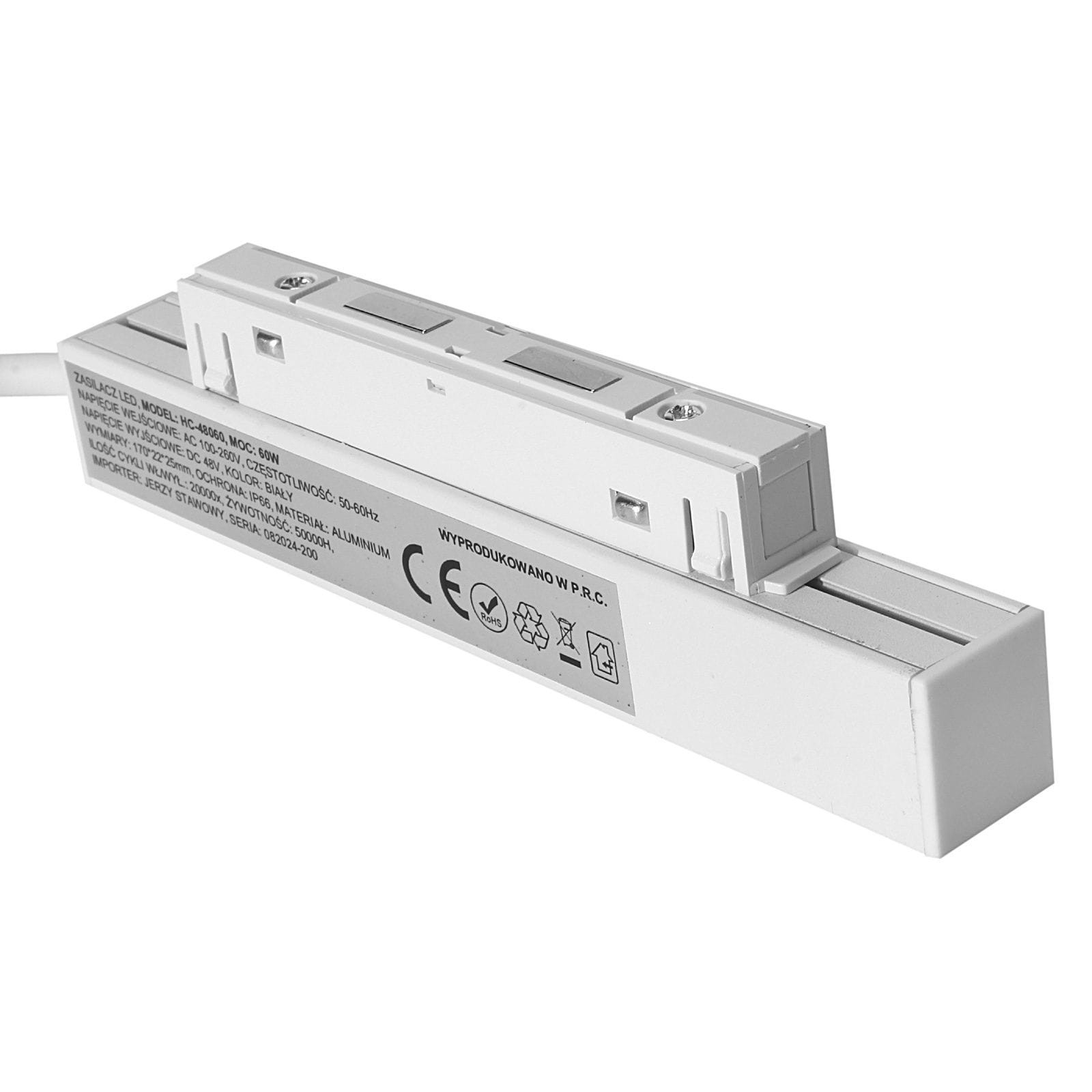 Zasilacz wpinany do szyn magnetycznych, biały, o mocy 60W i napięciu 48DC. Widoczny z boku, z przyciskami na górze oraz oznaczeniami technicznymi na boku. Prosty, prostokątny kształt, przeznaczony do montażu w systemach oświetleniowych.
