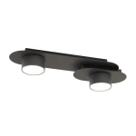 Lampa sufitowa Stilo w kolorze czarnym z dwoma oprawami GX53, zamontowana na płaskiej podstawie. Cylindryczne klosze z białym wnętrzem, skierowane w dół, zapewniają równomierne oświetlenie. Prosty, nowoczesny design.