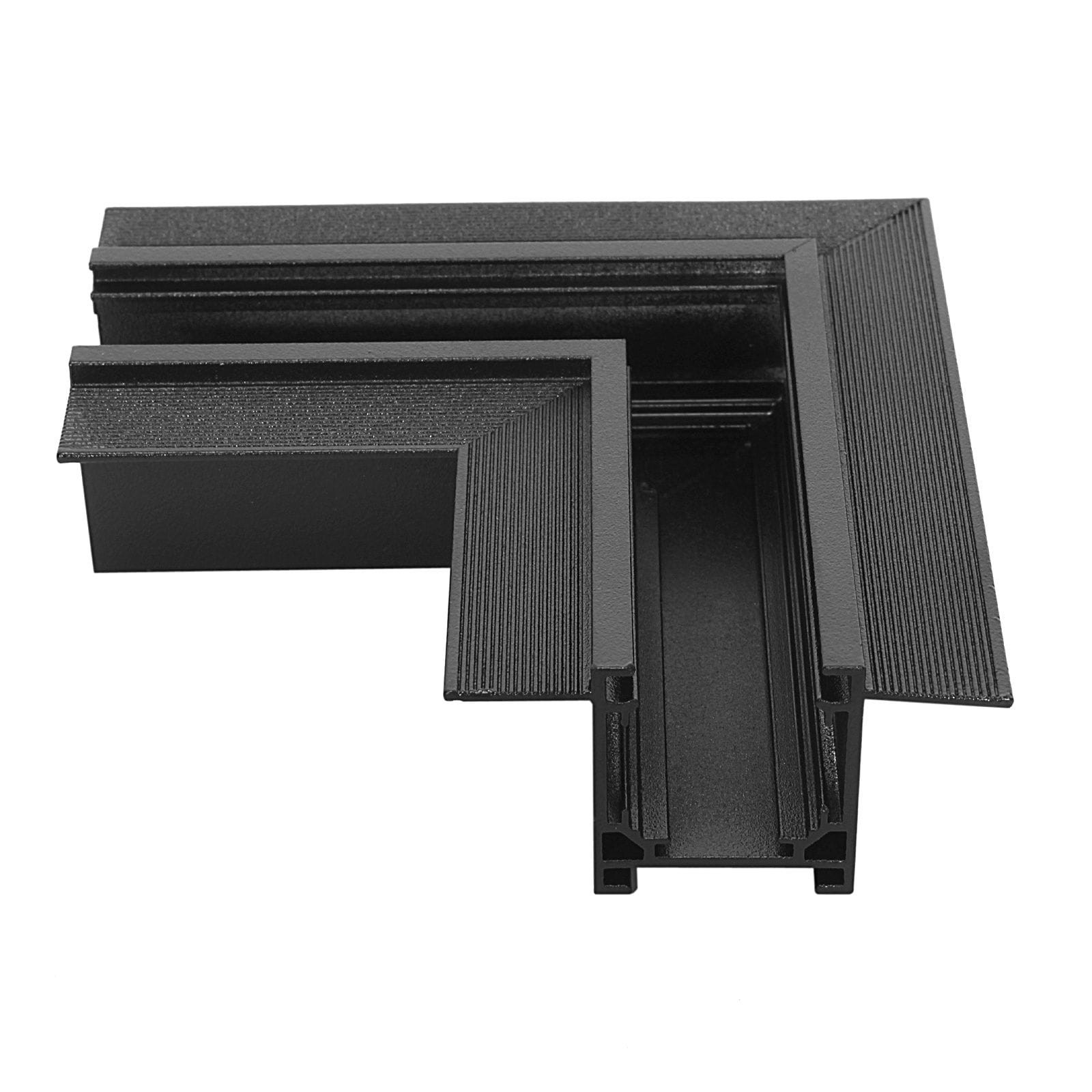 Łącznik kątowy do szyn magnetycznych podtynkowych MINI w kolorze czarnym, wykonany z matowego materiału. Ujęcie z góry pokazuje kształt litery L z wyraźnymi rowkami i brzegami, umożliwiającymi łatwe łączenie szyn.