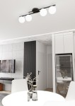 Lampa sufitowa Kairo w kolorze czarnym z opalowymi kloszami, montowana na suficie, z czterema źródłami światła E14. Widoczna w nowoczesnym wnętrzu, z białym stołem i dekoracjami.