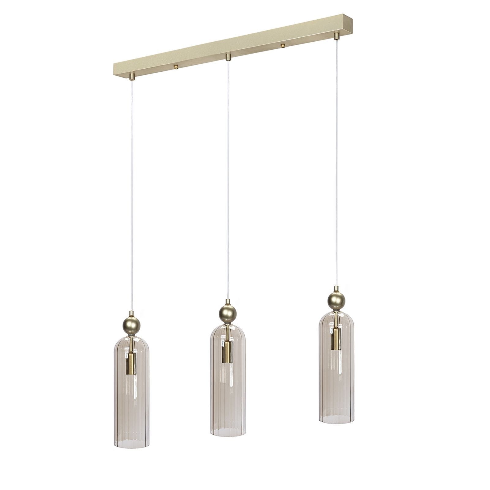 Lampa wisząca Regina 3xE14 w kolorze złotym z trzema przezroczystymi kloszami w formie cylindrów, zawieszona na białych linkach. Klosze mają delikatne żłobienia, a całość osadzona na prostokątnej, złotej podstawie.