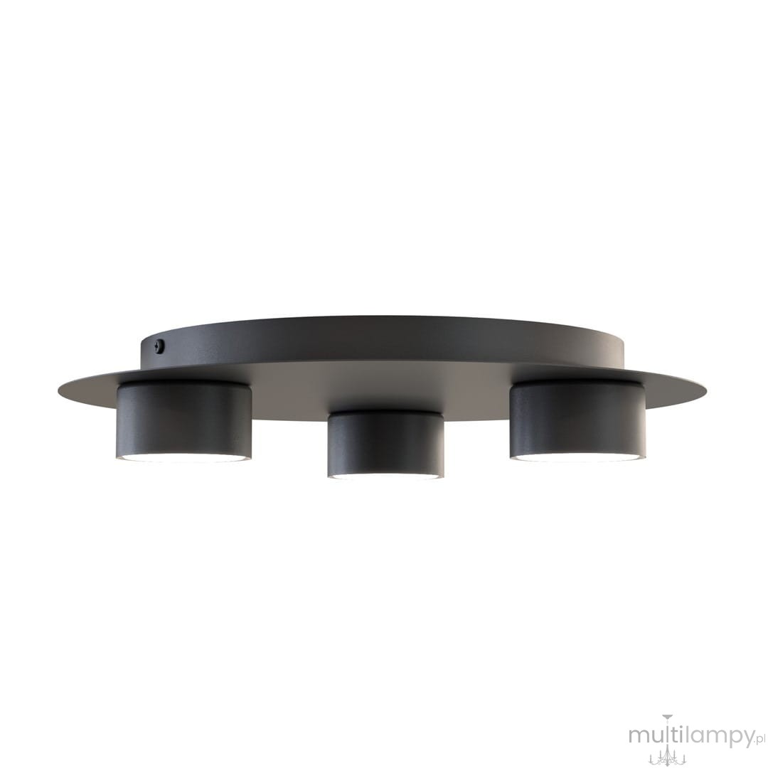 Czarna lampa sufitowa Bolx z trzema oprawami GX53, okrągła podstawa z matowego metalu, umieszczona pod kątem. Lampy mają cylindryczny kształt, z białymi kloszami, na jednolitym, jasnym tle.