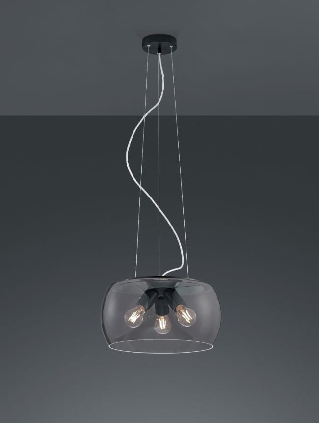 Lampa wisząca Valente w kolorze antracytowym, z przezroczystym kloszem, zawiera trzy źródła światła E27. Produkt zawieszony na białych kablach, z okrągłym, czarnym mocowaniem sufitowym. Kształt klosza półkulisty.