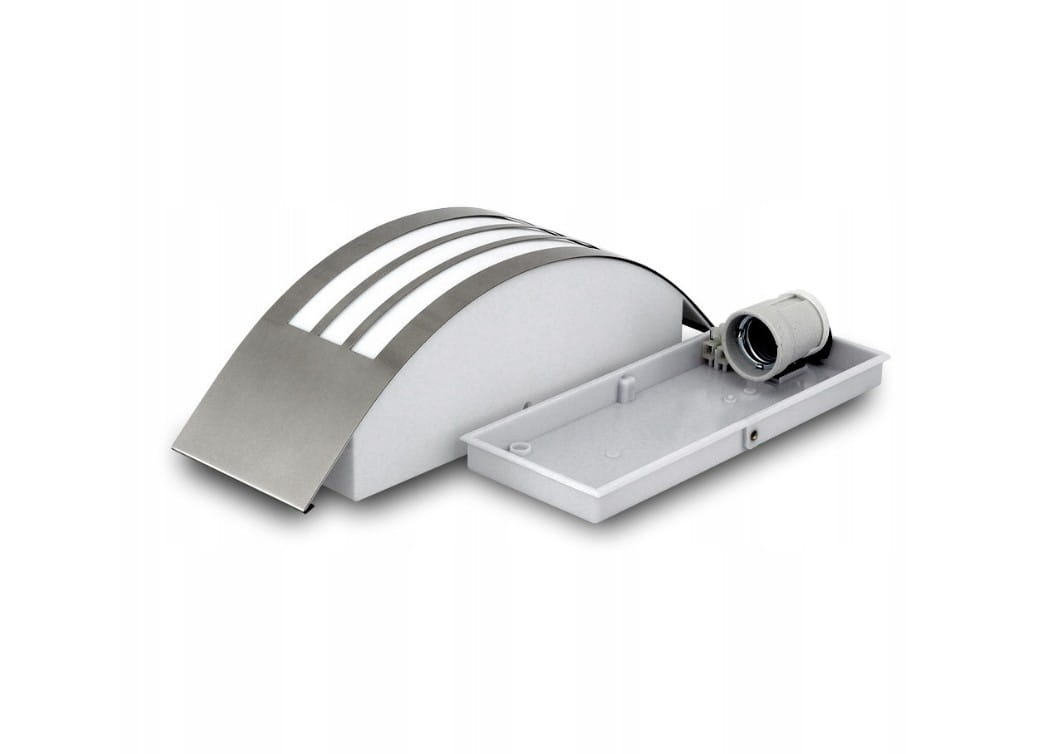 Kinkiet elewacyjny Doris w kolorze srebrnym, o zaokrąglonym kształcie. Posiada trzy białe paski na przedniej części, miejsce na żarówkę E27 oraz prostokątną podstawę. Produkt leży na płaskiej powierzchni, ukazując detale konstrukcji.