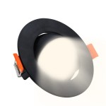 Oprawa do zbudowy LED 3W/5W/7W/CCT w kolorze czarnym z elementami w kolorze pomarańczowym. Ujęcie z góry, pokazujące okrągły kształt, metalową siatkę wewnętrzną oraz sprężynowe mocowanie. Produkt w pozycji zamkniętej.