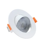 Biała oprawa LED do zabudowy, model LP-1506/1RS WH, z okrągłym kształtem i widocznym kloszem. Zawiera metalowe mocowanie i pomarańczowe uchwyty. Przeznaczona dla źródeł światła 3W/5W/7W, z możliwością regulacji temperatury barwowej.