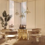 Lampa wisząca LED Bangkok o mocy 12W, w kolorze czarnym z bursztynowym kloszem, zawieszona nad okrągłym, szklanym stołem. W tle widoczne zasłony w poziome paski oraz roślina doniczkowa. Eleganckie krzesła z przezroczystymi nogami dopełniają aranżację.