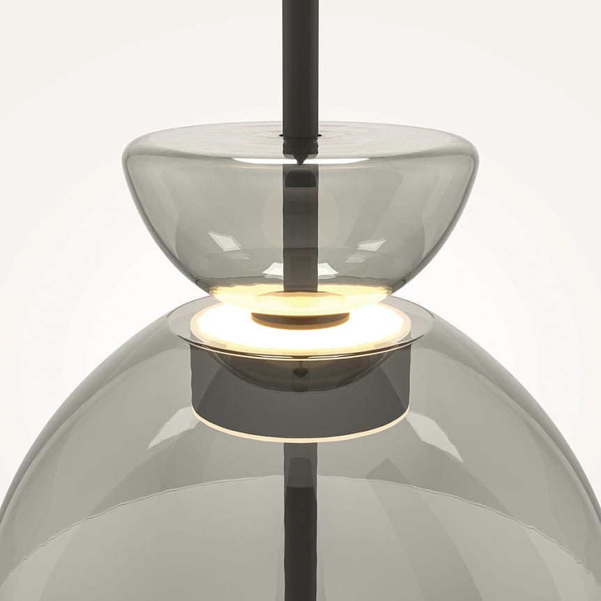 Lampa wisząca LED Bangkok, 12W, z czarnym metalowym stelażem. Klosz w odcieniach szaro-przezroczystych, o zaokrąglonym kształcie. Widoczny element źródła światła w centralnej części, z delikatnym podświetleniem. Ujęcie z góry.