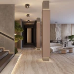 Czarna lampa sufitowa Glassy z miejscem na żarówkę E27, o nowoczesnym designie, zamontowana w eleganckim wnętrzu. W tle widać dymione dodatki oraz stonowane kolory, tworzące harmonijną aranżację.