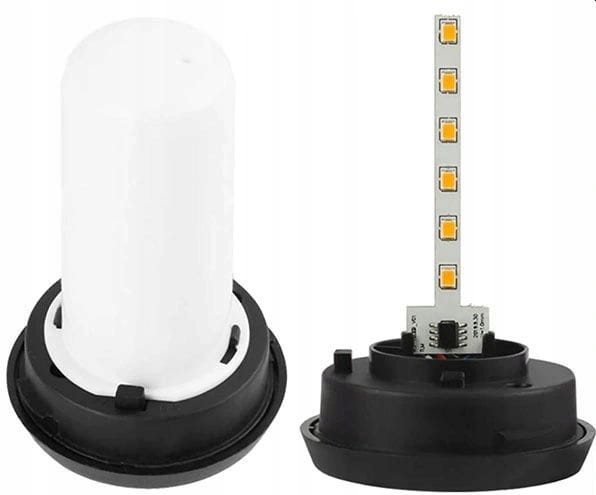 Lampka solarna ogrodowa, czarna, z wbudowanym modułem LED, widoczna w dwóch częściach: przezroczysta osłona i czarna podstawa. Kształt cylindryczny, przeznaczona do wbicia w ziemię. Długość 50 cm.