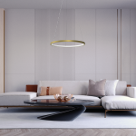 Lampa wisząca LED Hoop, 27W, w złotej oprawie, o okrągłym kształcie, zawieszona na cienkich linkach. Znajduje się nad czarnym stołem kawowym w nowoczesnym wnętrzu z jasnymi ścianami i kanapą w odcieniach szarości i beżu.