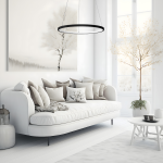 Lampa wisząca LED Hoop, czarna, o mocy 27W, zawieszona nad białą sofą w jasnym wnętrzu. Okrągły kształt, minimalistyczny design. W tle delikatne obrazy i dekoracyjne drzewo. Idealna do nowoczesnych aranżacji.