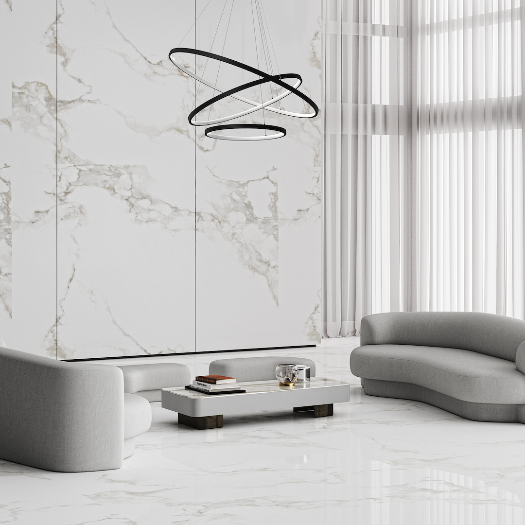 Lampa wisząca Hoop z trzema źródłami LED, czarna, o nowoczesnym designie. Zawieszona w centralnej części pomieszczenia, w kształcie trzech nachodzących na siebie pierścieni.