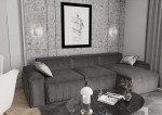 Lampa stołowa Mush w kolorze białym, z okrągłym kloszem i metalową podstawą, ustawiona na czarnym, marmurowym stole. W tle szary narożnik z poduszką oraz grafika w ramie na ścianie. Jasne tło i stonowana aranżacja wnętrza.