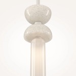 Lampa wisząca Kyoto 1xG9 w kolorze białym. Konstrukcja składa się z dwóch okrągłych elementów w górnej części oraz przezroczystego klosza. Całość ma gładką, błyszczącą powierzchnię, zawieszona na cienkim przewodzie. Tło jasne i jednolite.