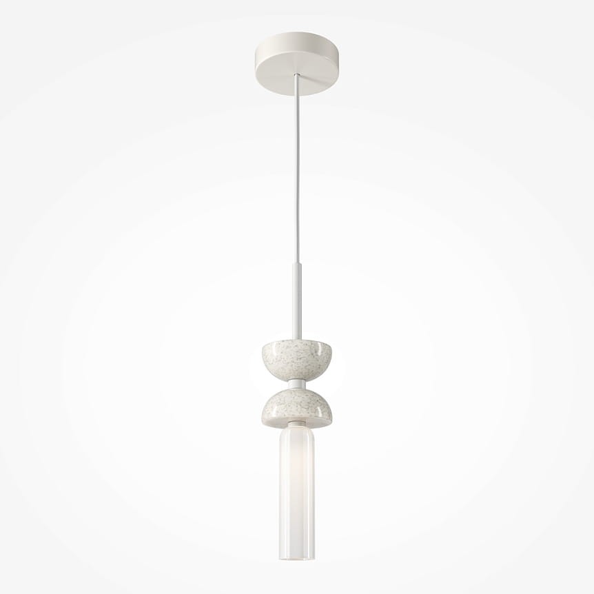 Lampa wisząca Kyoto 1xG9 w kolorze białym, zawieszona na cienkim, białym przewodzie. Posiada dekoracyjne elementy w formie dwóch okrągłych, jasnych podstaw oraz przezroczysty klosz w kształcie walca. Proste tło podkreśla elegancki design.