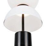 Lampa stołowa LED Kyoto o mocy 11W w kolorze czarnym. Posiada okrągłą, białą czaszę na górze oraz dolną część w formie cylindrycznej podstawy z czarnego materiału. Ujęcie z góry, ukazujące detale konstrukcji i źródło światła.