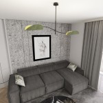 Lampa sufitowa Lotus 2xE14 w kolorze czarnym i zielonym, z dwoma asymetrycznymi kloszami, zawieszona na cienkim, ciemnym stelażu. Produkt w nowoczesnym stylu, umieszczony w aranżacji z szarym tłem i sofą w kolorze grafitowym.