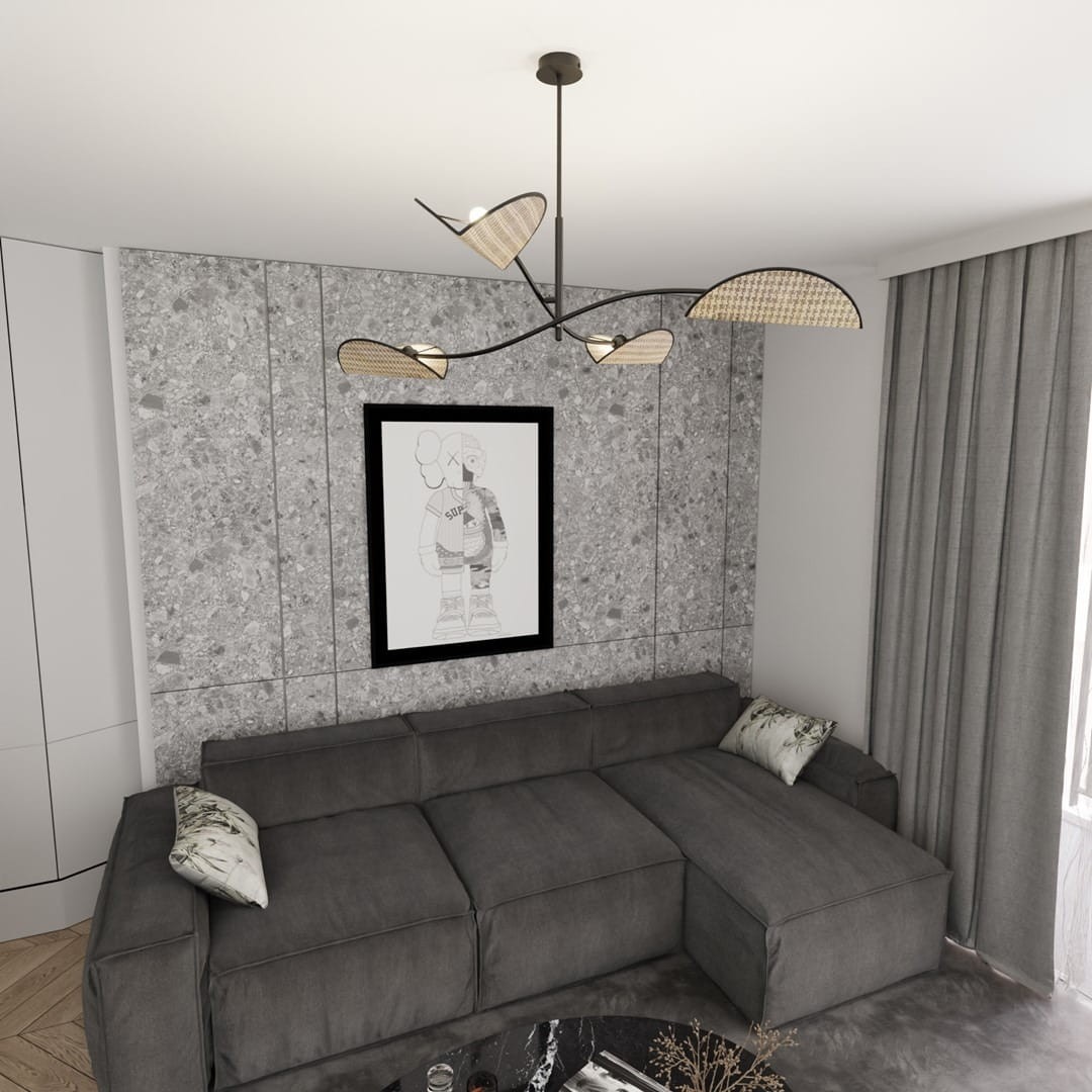 Lampa sufitowa Lotus 4xE14 w kolorze czarnym z naturalnymi akcentami. Posiada cztery klosze w kształcie liści, umieszczone na elastycznych ramionach, zawieszona w nowoczesnym wnętrzu z szarymi ścianami i sofą.
