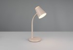 Beżowa lampa biurkowa Pongo z kloszem o stożkowym kształcie, zamontowana na giętkim ramieniu. Ustawiona na okrągłej podstawie, włączona, emitująca ciepłe światło. Tło w odcieniach szarości, prostota aranżacji.