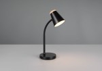 Lampa biurkowa Pongo w kolorze czarnym, z metalowym kloszem o stożkowym kształcie i drewnianym wykończeniem. Ujęcie z boku, stojąca na okrągłej podstawie, z wbudowanym źródłem LED 4,5W, emitującym ciepłe światło. Tło szare, proste.