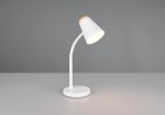 Biała lampa biurkowa Pongo z lampą LED 4,5W, posiadająca zaokrągloną podstawę i elastyczny, łukowaty uchwyt. Oświetlenie w kloszu o stożkowym kształcie z drewnianym akcentem na górze, ustawiona na gładkiej powierzchni.