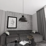 Czarna lampa wisząca Lunaro L z oprawą na jedną żarówkę GX53, zawieszona nad szaro-czarną sofą w nowoczesnym wnętrzu. Tło z jasnych, teksturowanych ścian i ciemnych zasłon podkreśla minimalistyczny design lampy.
