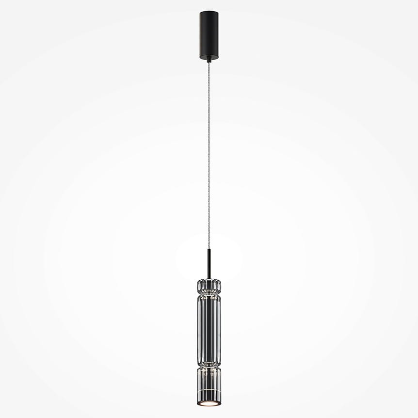 Lampa wisząca Ordo H38 LED o mocy 8W, w kolorze czarnym z dymionym kloszem. Ma cylindryczny kształt, zawieszona na cienkim kablu. Widoczny metalowy uchwyt montażowy w kolorze czarnym. Tło jednolite, jasne.
