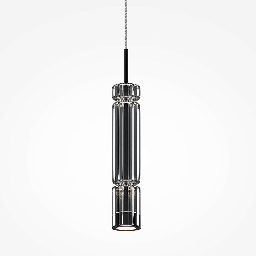 Lampa wisząca LED Ordo H38 o mocy 8W, w kolorze czarnym z dymionym kloszem. Ma cylindryczny kształt i jest zawieszona na cienkim przewodzie. Przeznaczona do nowoczesnych wnętrz, idealna na stół lub w przestrzeni mieszkalnej.