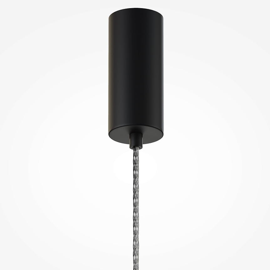 Lampa wisząca Ordo H58 LED o mocy 8W, w kolorze czarnym z koniakowym akcentem. Cylindryczny klosz, zawieszony na plecionym przewodzie, widoczny z dołu na jasnym tle, podkreślający minimalistyczny design.