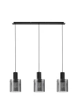 Lampa wisząca Oran 3xE27 w kolorze czarnym, z trzema przezroczystymi kloszami na długich przewodach. Utrzymana w minimalistycznym stylu, zamontowana na prostokątnej, czarnej podstawie. Idealna do nowoczesnych wnętrz.